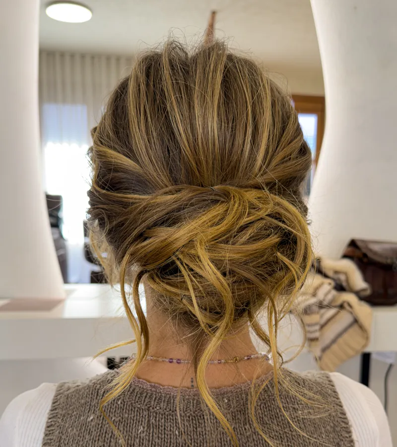 Client with smooth, shiny brunette balayage hair